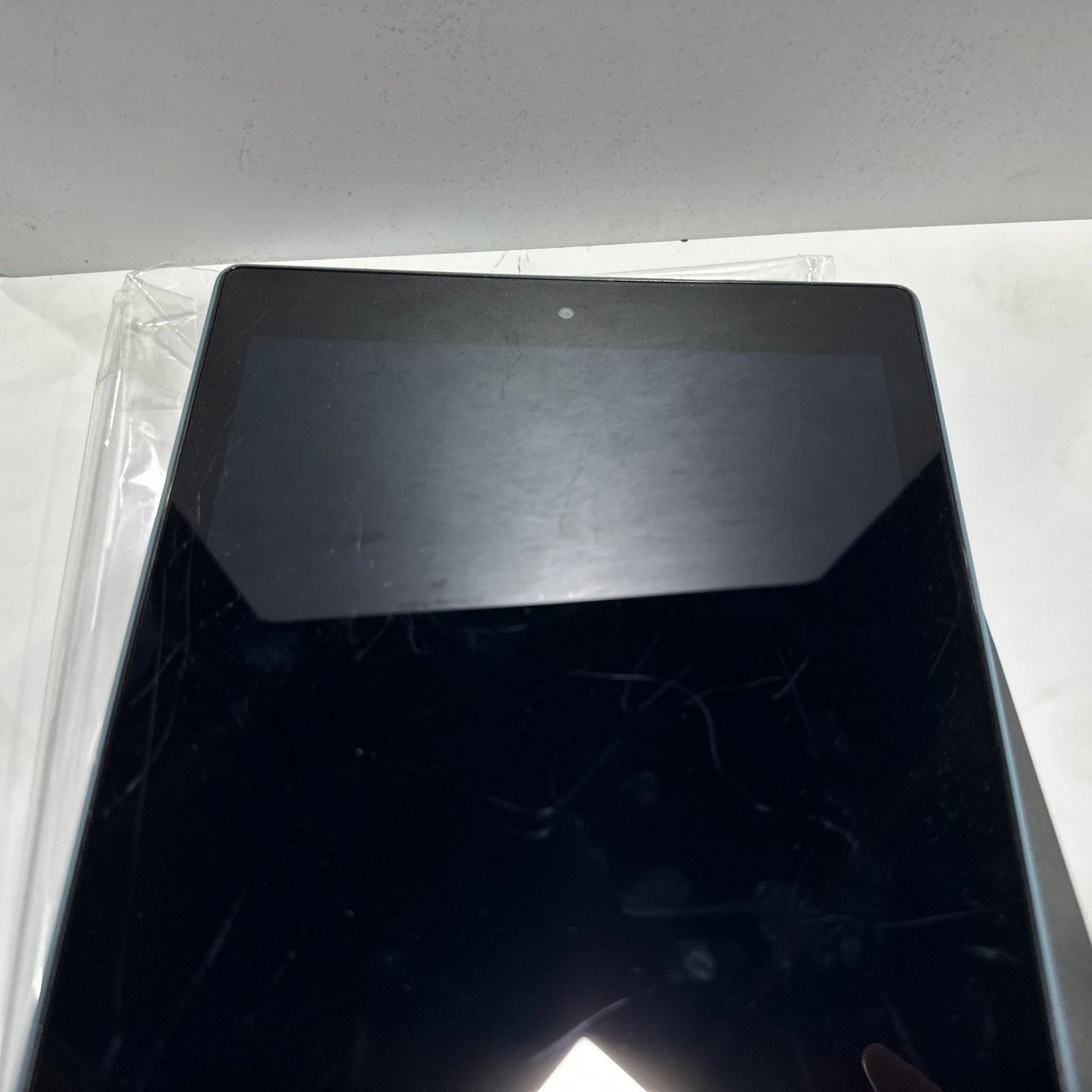 Fire HD used Tested Works Great With Scratches.