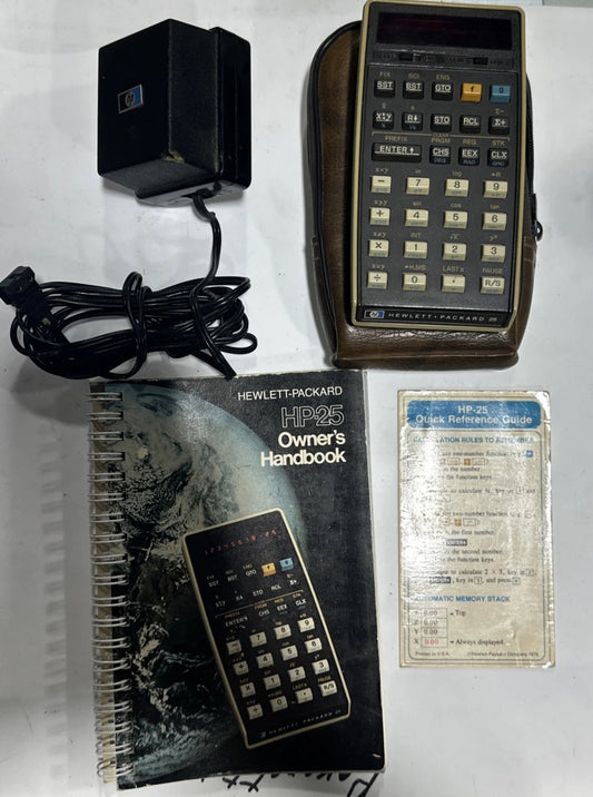 Hewlett-Packard HP 25 calculator W/ owner’s manual, Case, charger For Parts
