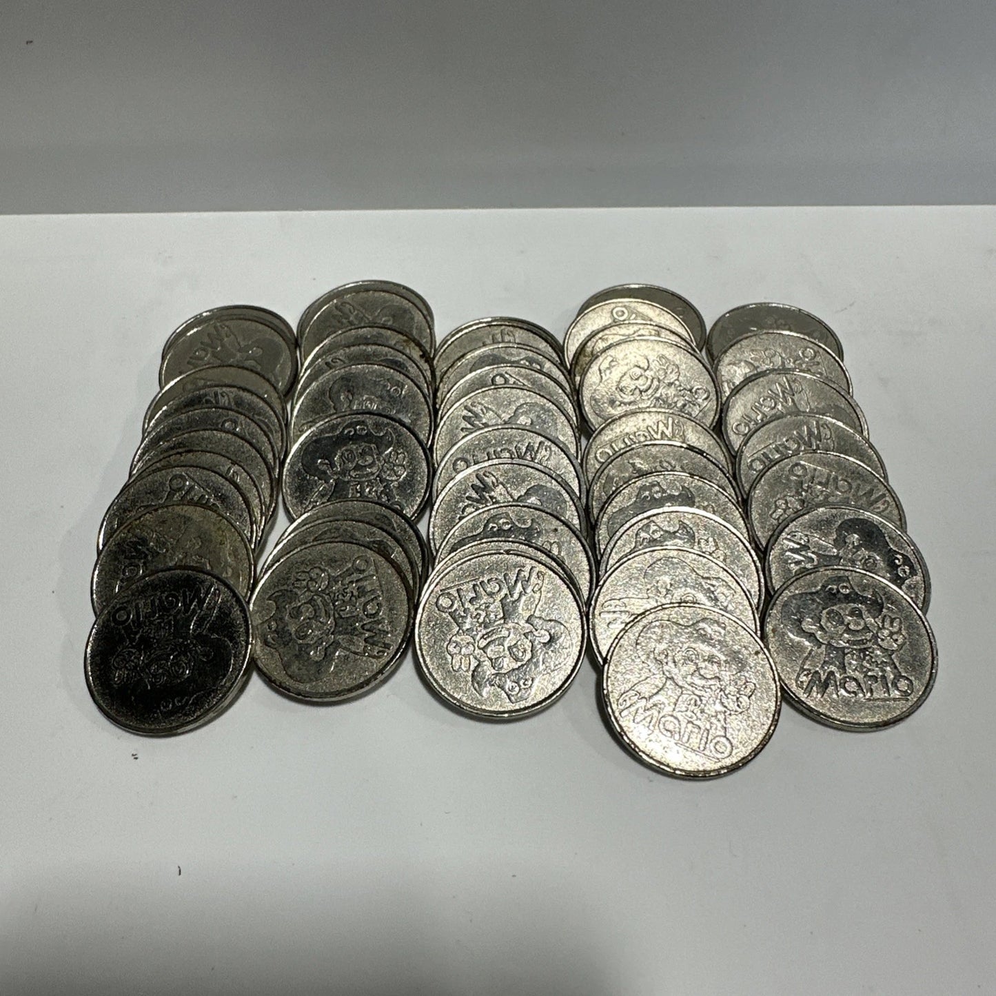 RARE 1980s SUPER MARIO VINTAGE ARCADE TOKEN SILVER TONE SHERIFF JAPAN LOT OF 46