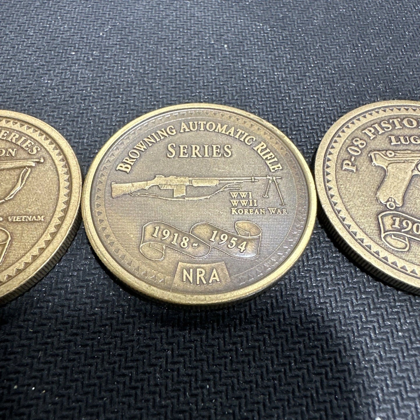 NRA Token Coins Luger, Browning Rifle, Thompson, And Grizzly Coin Lot