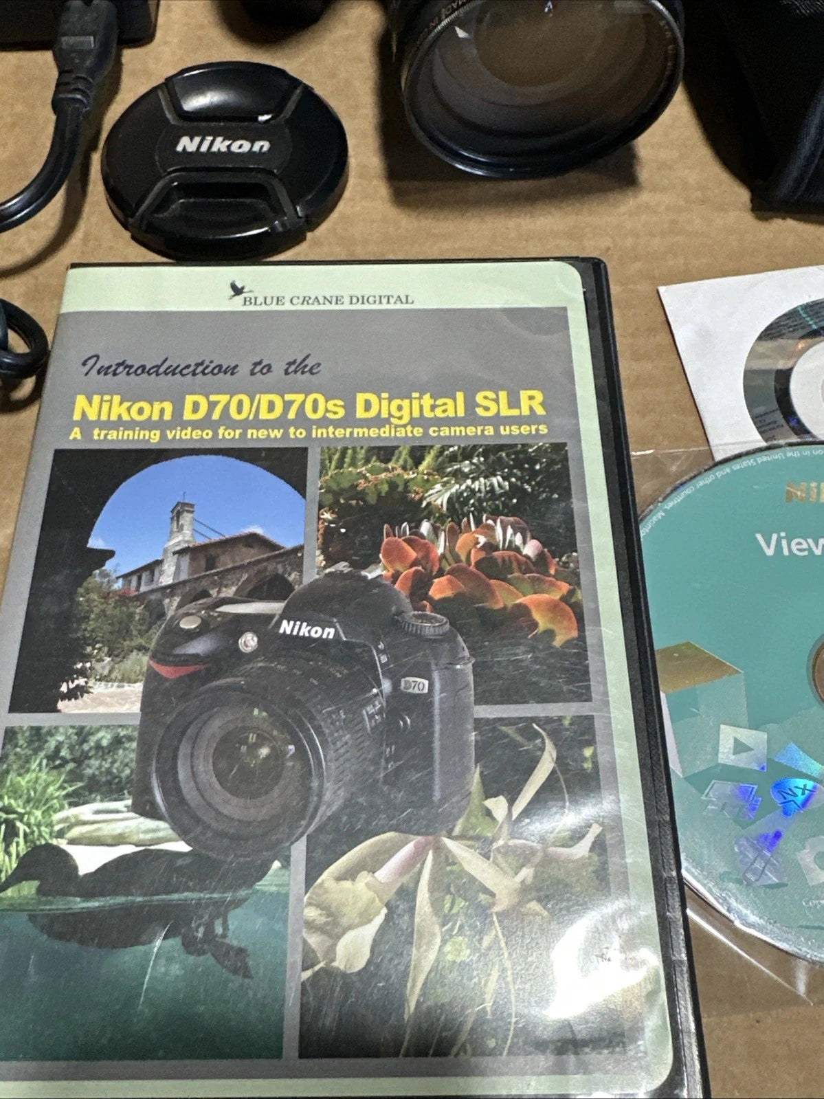 Canon Digital SLR Kit with Lense, Flash, Bag And Discs.