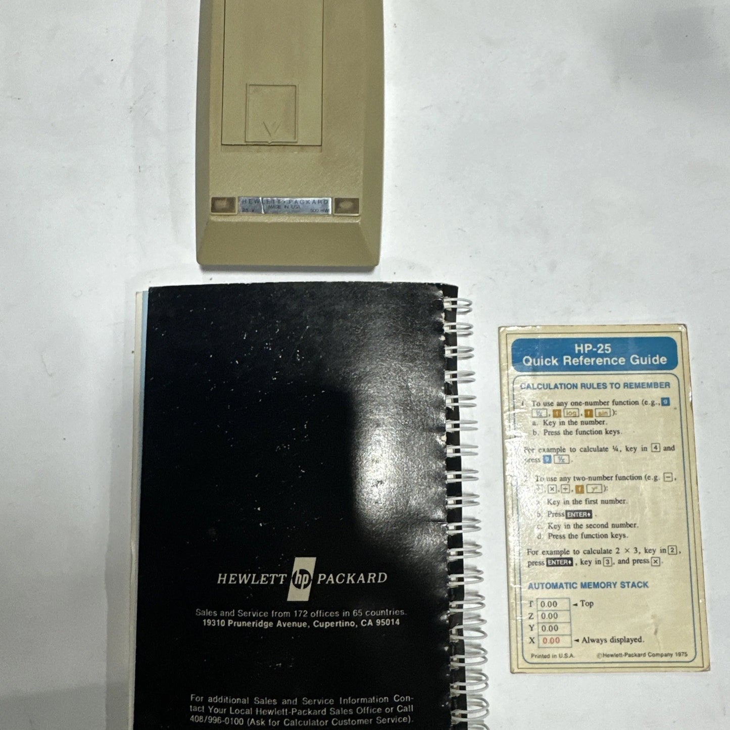 Hewlett-Packard HP 25 calculator W/ owner’s manual, Case, charger For Parts