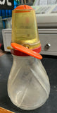 Vintage Glass Nut Grinder with Metal Top Turn Key and Measuring Cup Lid